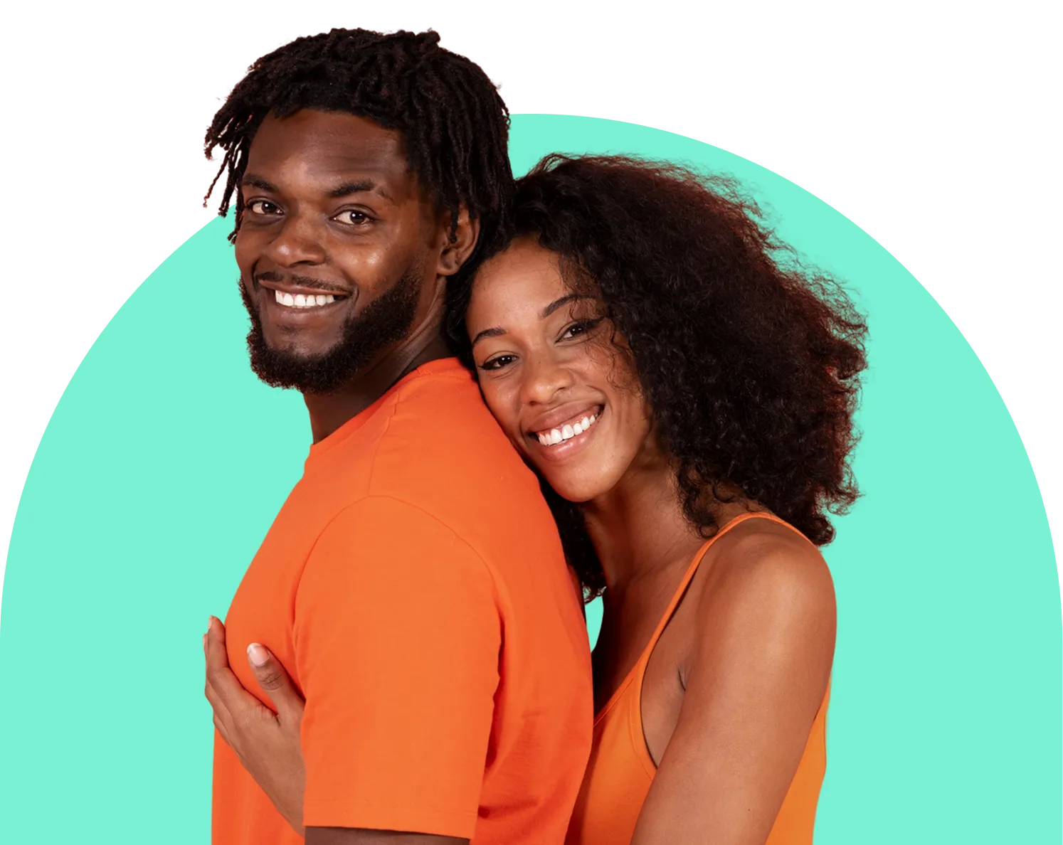 A person with long hair wearing glasses is sitting at a desk, looking at a laptop screen, and biting a yellow pencil in frustration. There is a cup filled with colored pencils in the foreground.