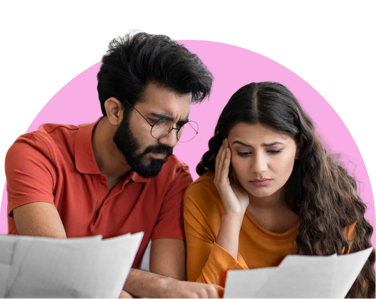 A small green plant with two leaves grows out of a glass jar filled with assorted coins. The background is blurred with soft, natural light, focusing attention on the plant and the jar. 