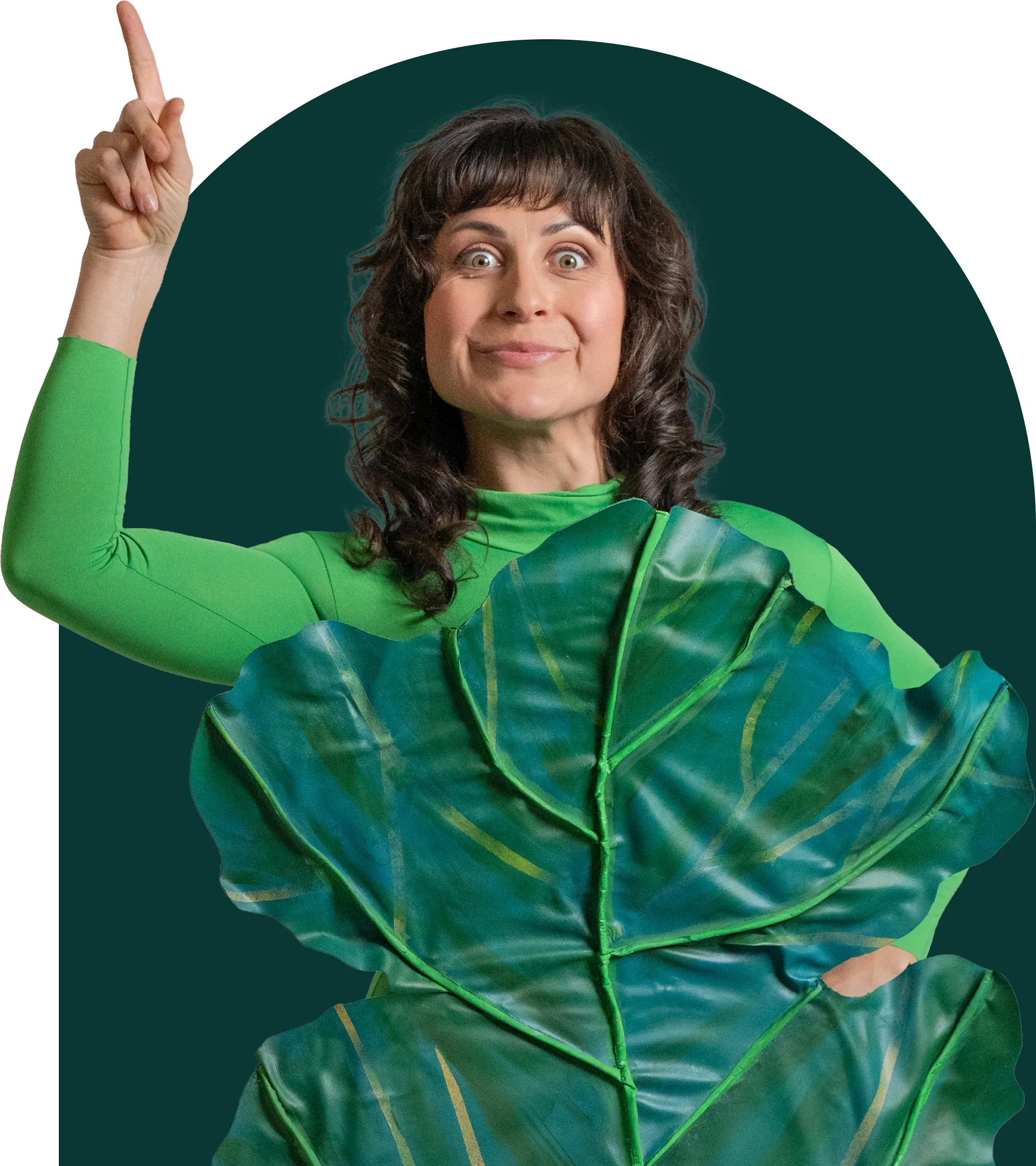 A woman smiling while holding a phone.